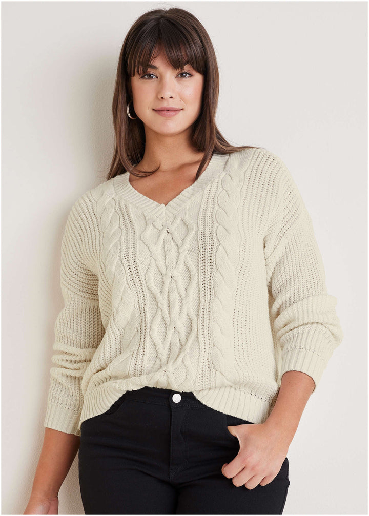Women's cream cable knit V-neck sweater with long sleeves