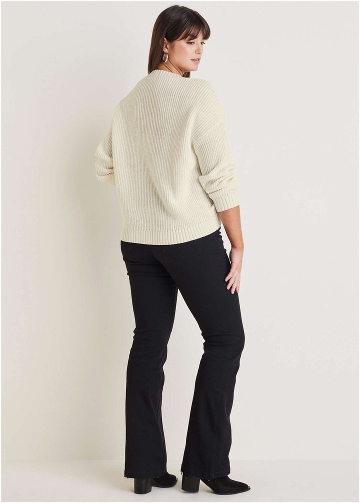 Women's cream cable knit V-neck sweater with long sleeves