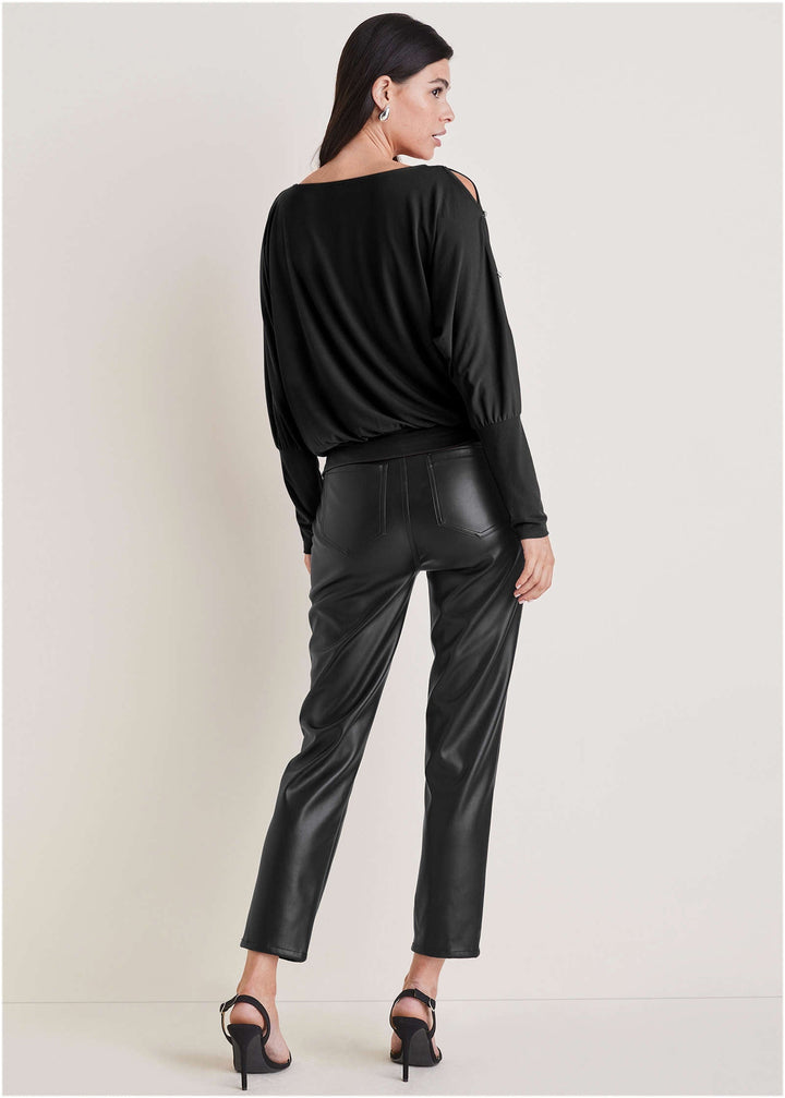 Women's black relaxed long sleeve top with round neckline