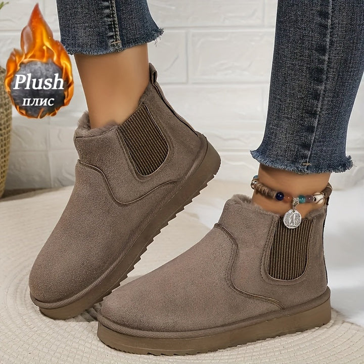 Women's winter ankle boots with faux fur lining and elastic side panels