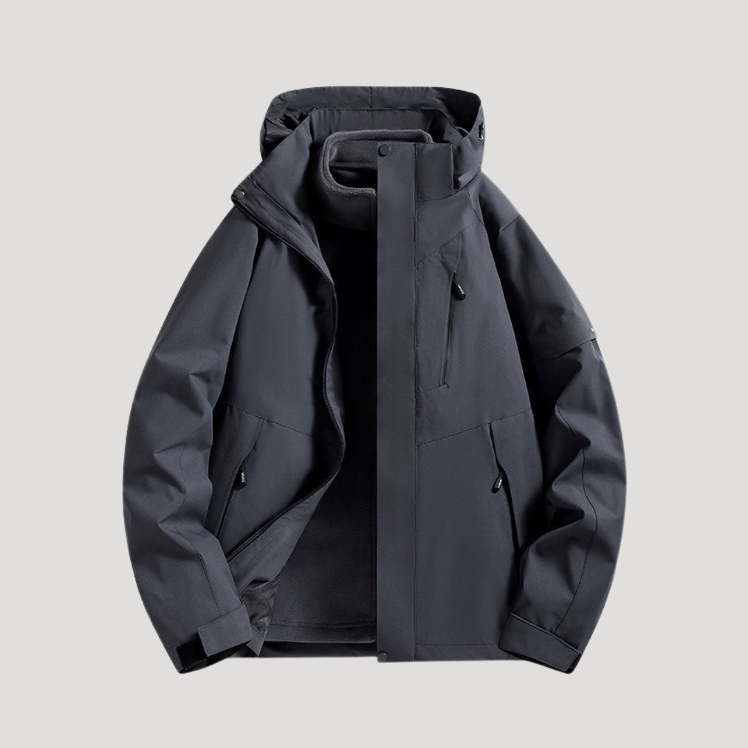 Women's hooded windbreaker jacket with zipped pockets