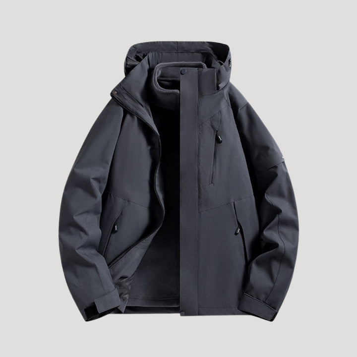 Women's hooded windbreaker jacket with zipped pockets