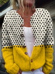 Women's cream and yellow polka dot colour block cardigan with brown buttons