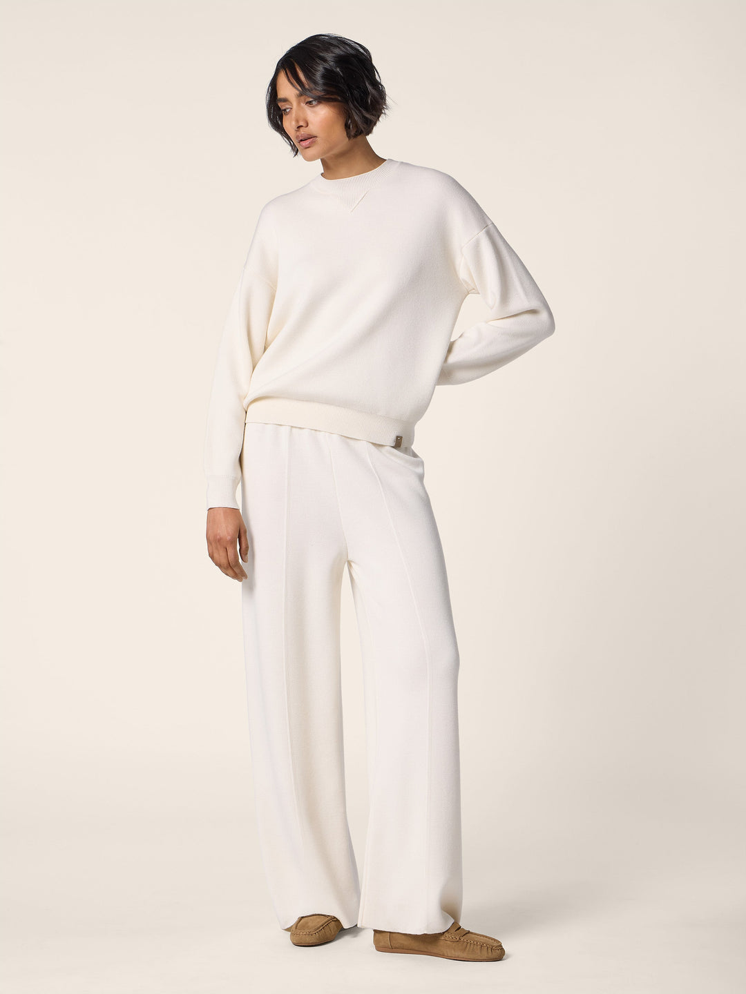 Women's cream crew neck jumper with long sleeves and ribbed trims