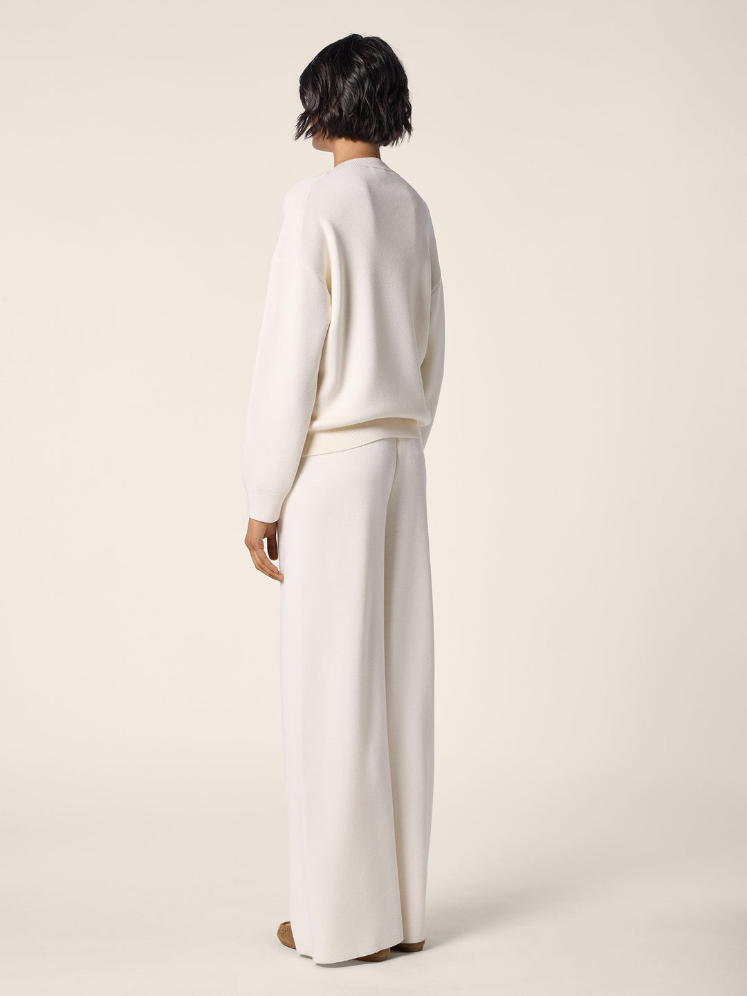 Women's cream crew neck jumper with long sleeves and ribbed trims
