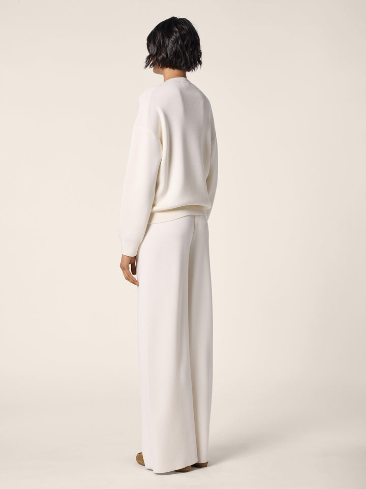 Women's cream crew neck jumper with long sleeves and ribbed trims