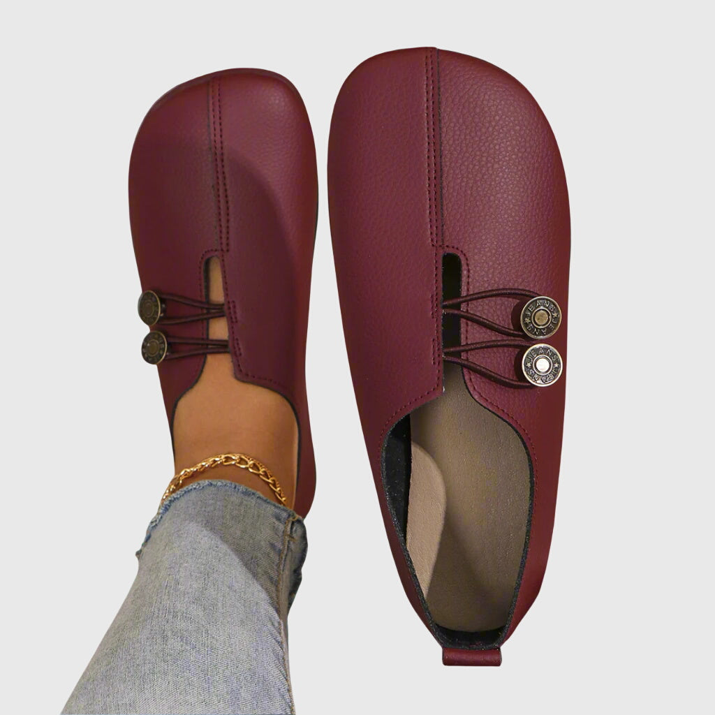 Women's lace-up ballet flats with round toes and button details