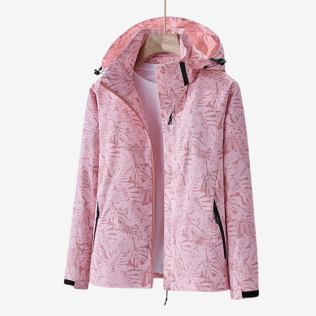 Women's hooded leaf print windbreaker jacket with zipped pockets