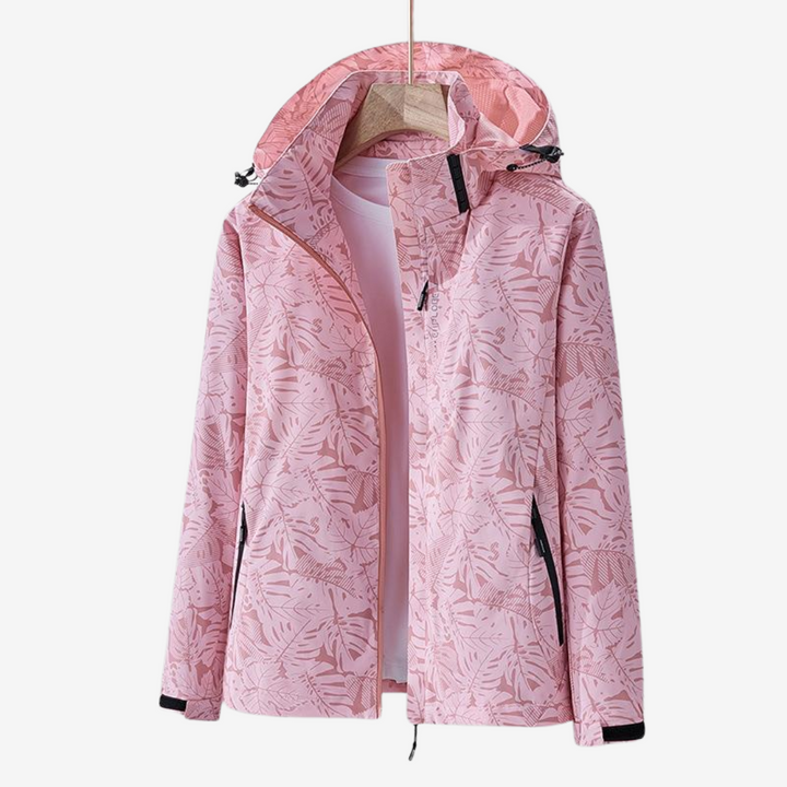 Women's hooded leaf print windbreaker jacket with zipped pockets