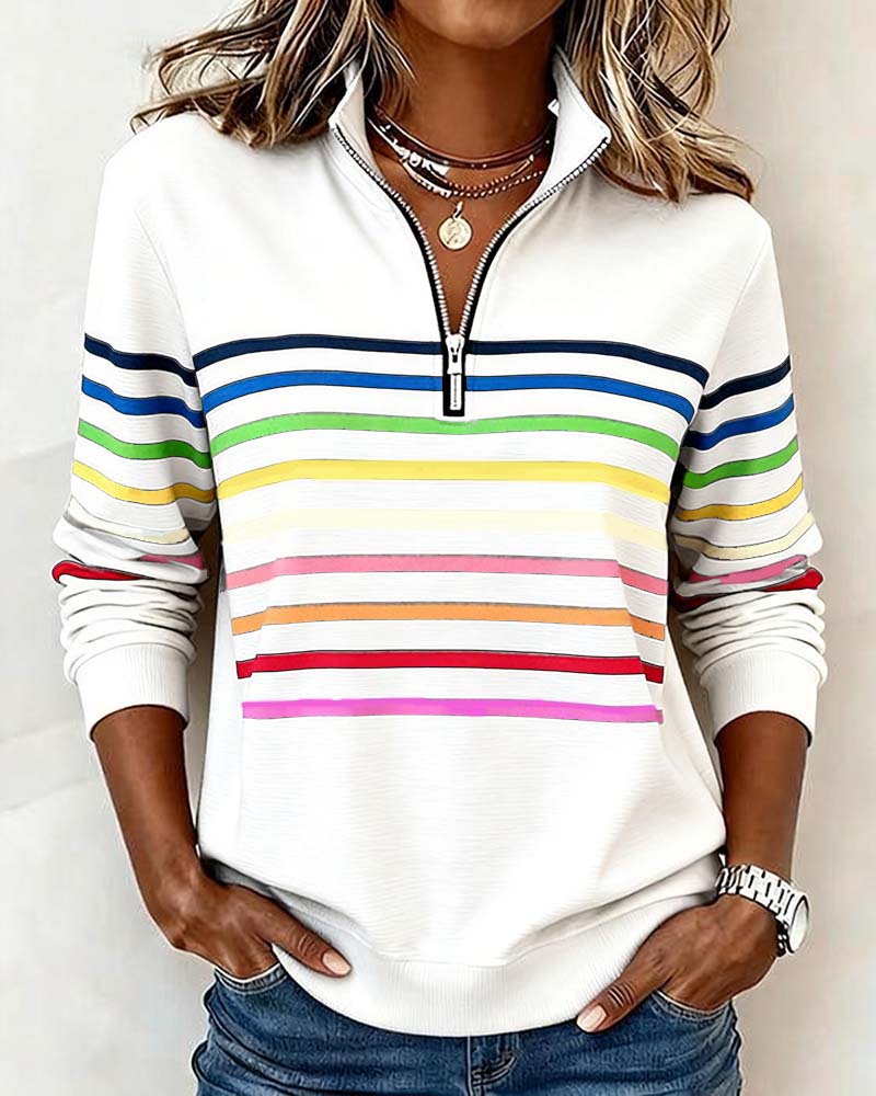 Women's striped half-zip sweatshirt with long sleeves and ribbed trims