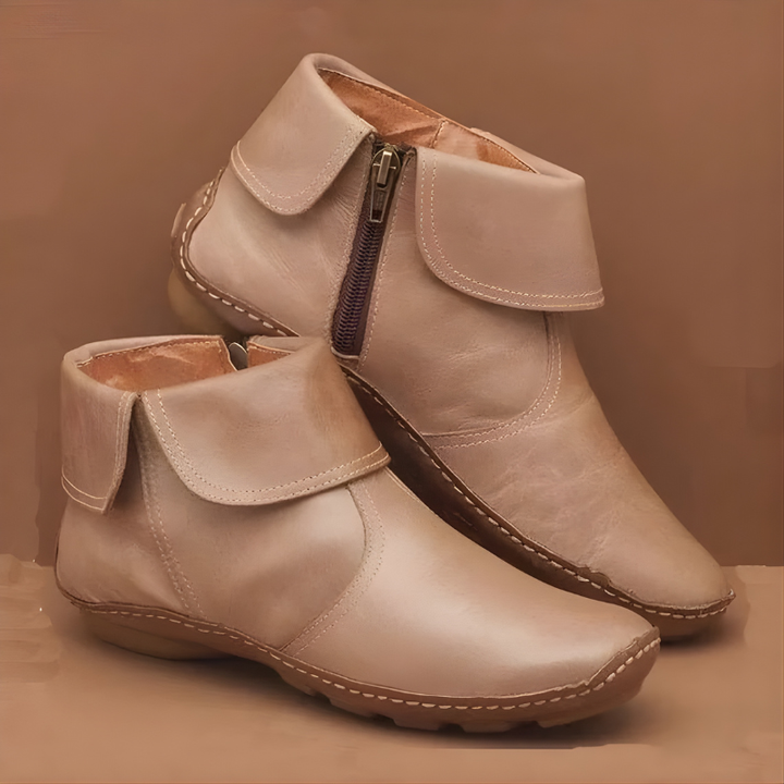 Women's ankle boots with round toe, side zip and low sole