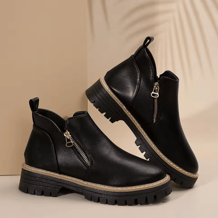 Women's platform ankle boots with side zippers and chunky lug soles
