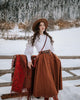 Women's brown button-front A-line midi skirt with belt
