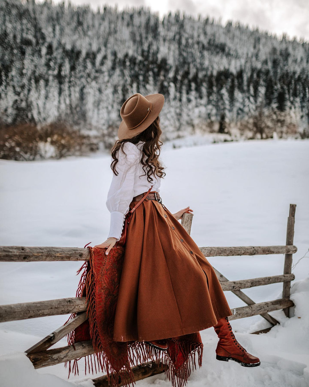 Women's brown button-front A-line midi skirt with belt