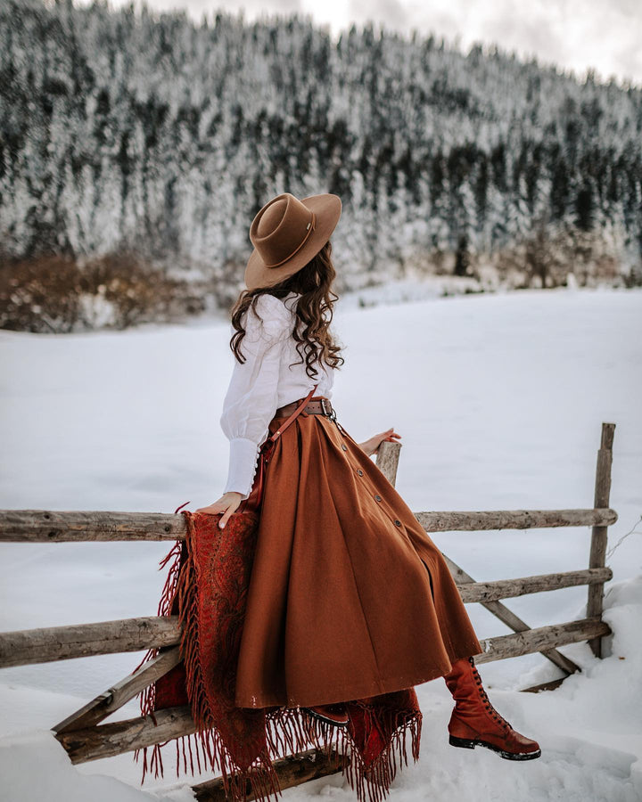 Women's brown button-front A-line midi skirt with belt