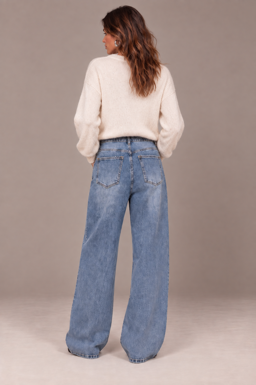 Women's light blue high-rise wide leg jeans with textured finish