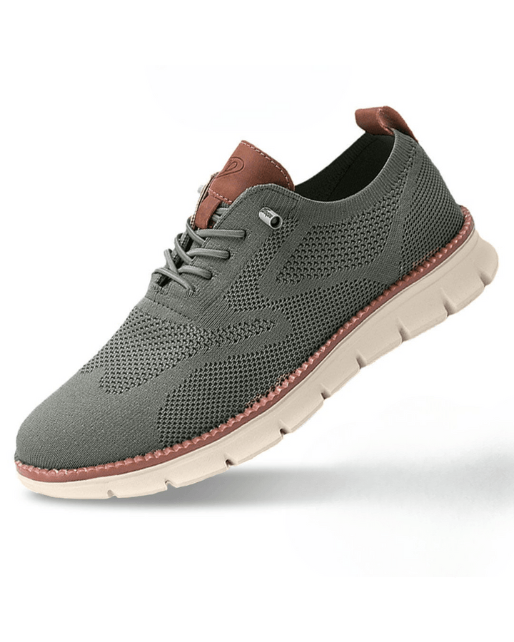 Unisex lace-up sneakers with textured panels and a white segmented sole