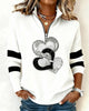 Women's white half zip sweatshirt with heart sequin design and black sleeve stripes