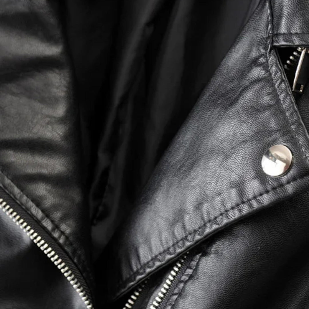 Women's black biker jacket with asymmetric zip and quilted sleeves