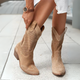 Women's perforated ankle boots with pointed toes and block heels