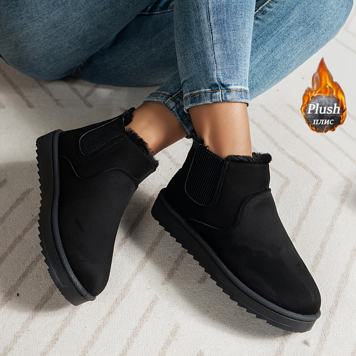 Women's winter ankle boots with faux fur lining and elastic side panels