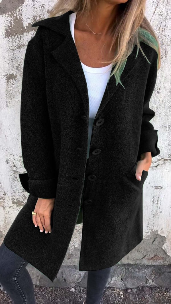 Women's long button-front coat with notched lapels and patch pockets