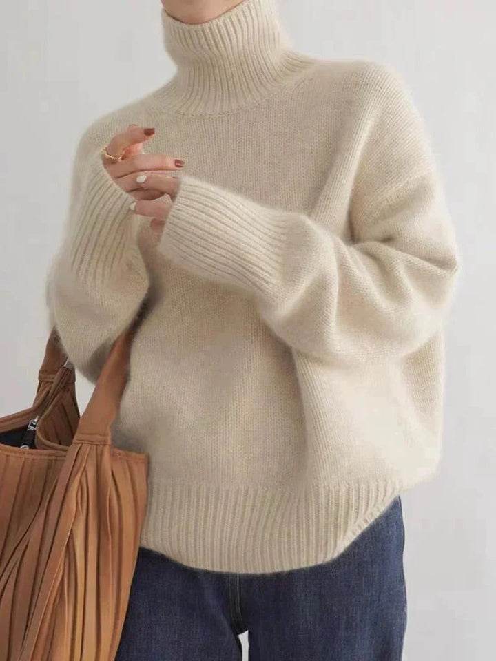 Women's relaxed plain turtleneck jumper with long sleeves and ribbed trims