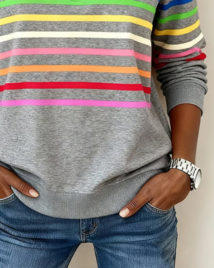 Women's striped half-zip sweatshirt with long sleeves and ribbed trims