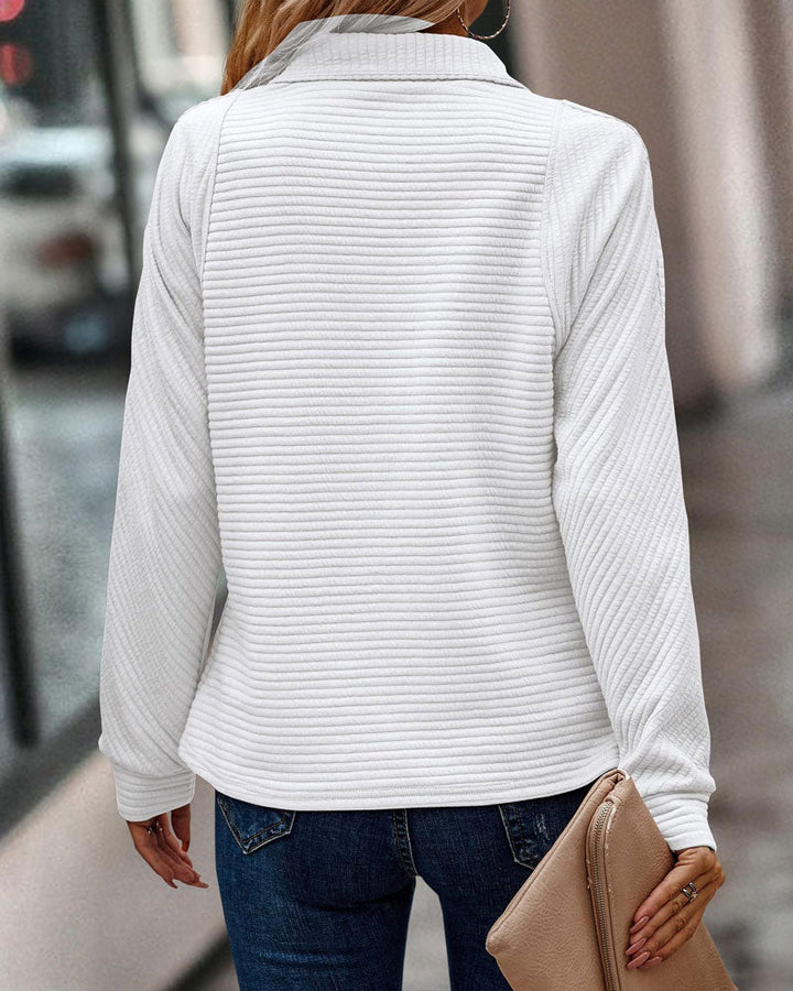 Women's textured quarter-zip sweatshirt with a high mock neck and long sleeves
