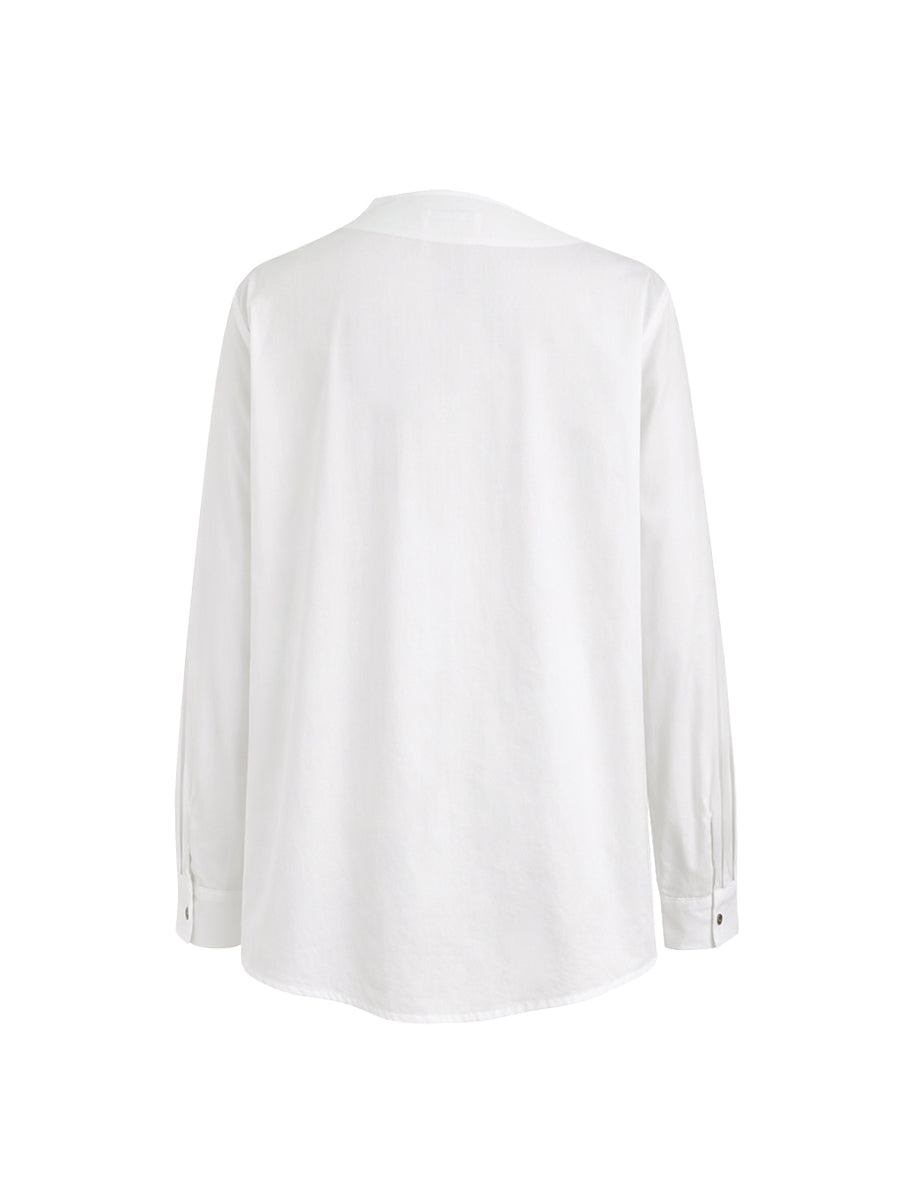 Women's white asymmetric buttoned blouse with mandarin collar and long sleeves