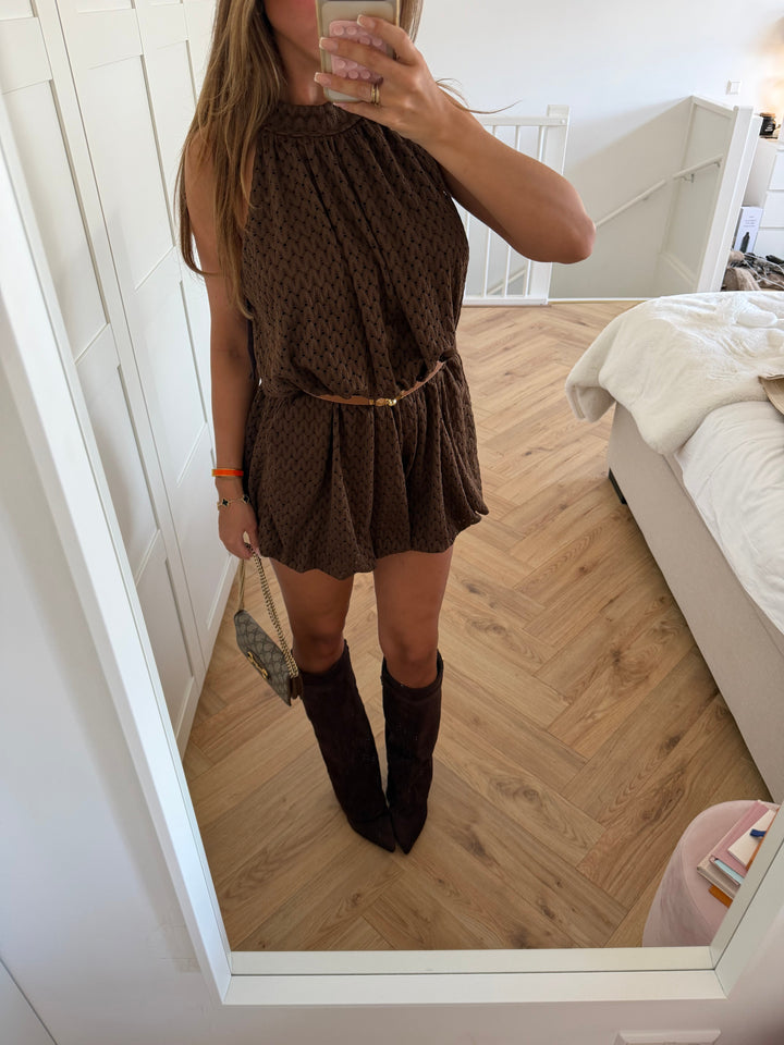Women's brown textured jumpsuit with turtleneck and sleeveless design