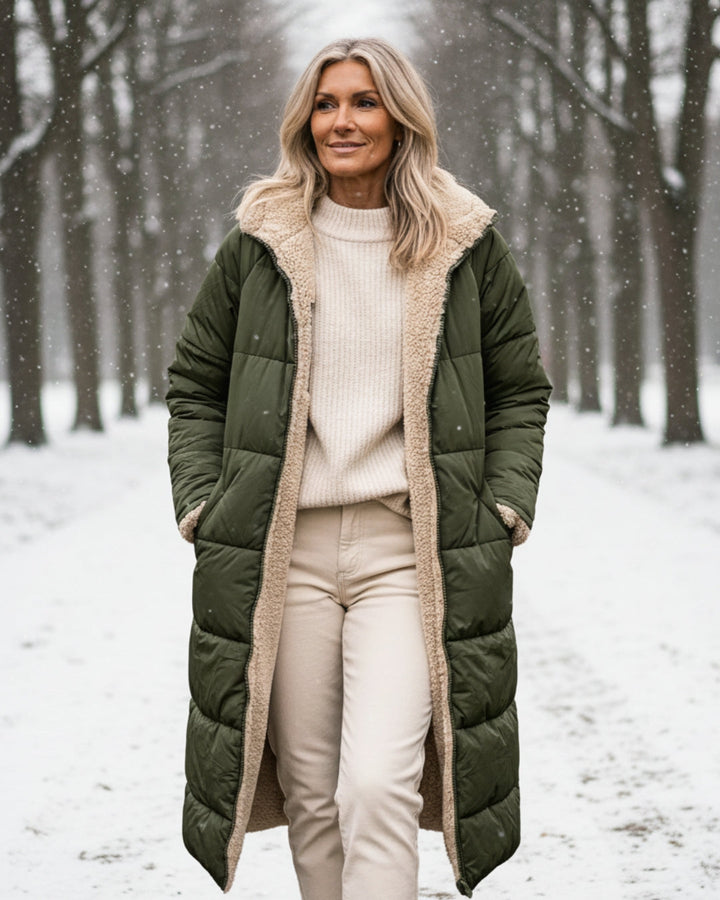 Women's long quilted hooded coat with contrasting textured lining