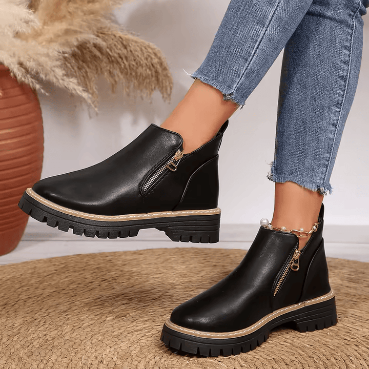 Women's platform ankle boots with side zippers and chunky lug soles