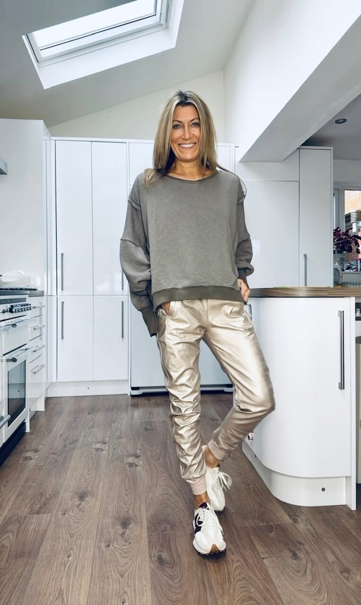 Women's casual sweatshirt top with round neckline and metallic leather pants set