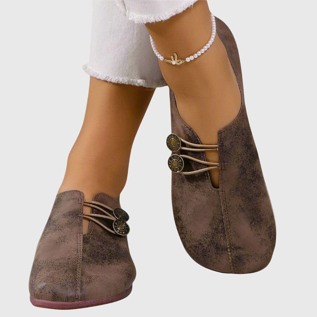 Women's lace-up ballet flats with round toes and button details