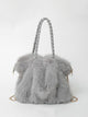 Women's faux fur shoulder bag with braided handles and chain strap
