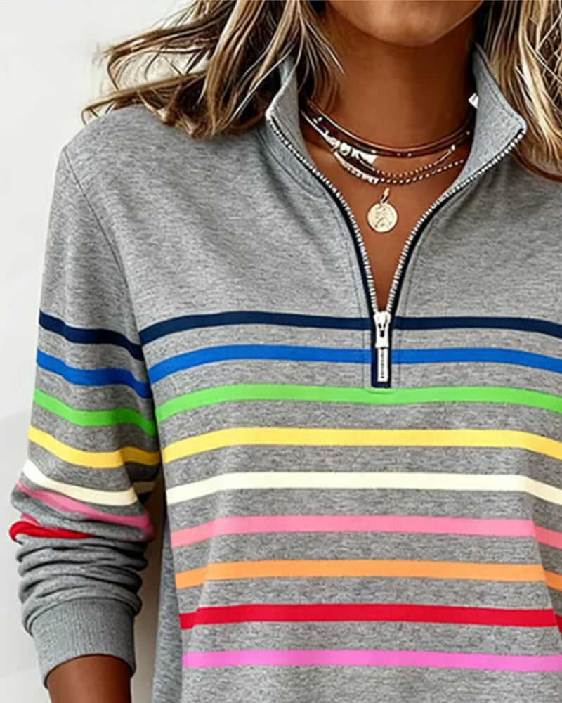 Women's striped half-zip sweatshirt with long sleeves and ribbed trims