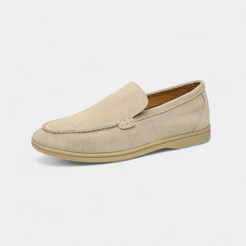Slip-on loafers with almond-shaped toe, stitched vamp detail and flat sole