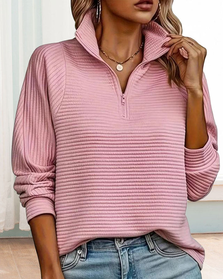 Women's textured quarter-zip sweatshirt with a high mock neck and long sleeves