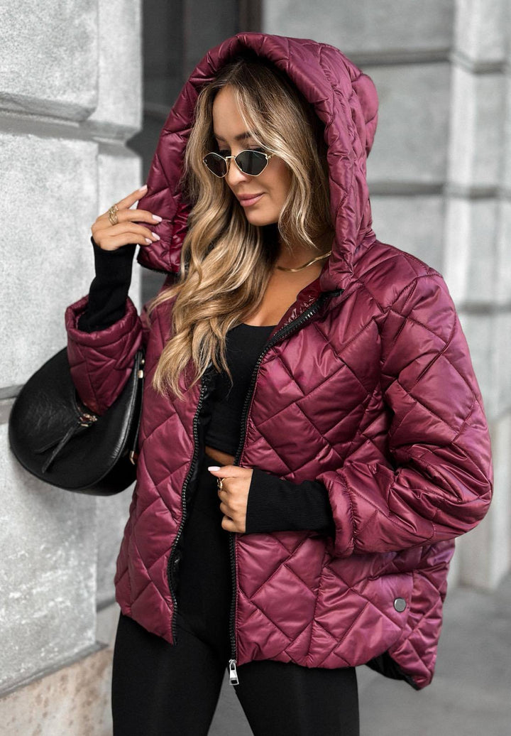 Women's quilted hooded jacket with long sleeves and zip front