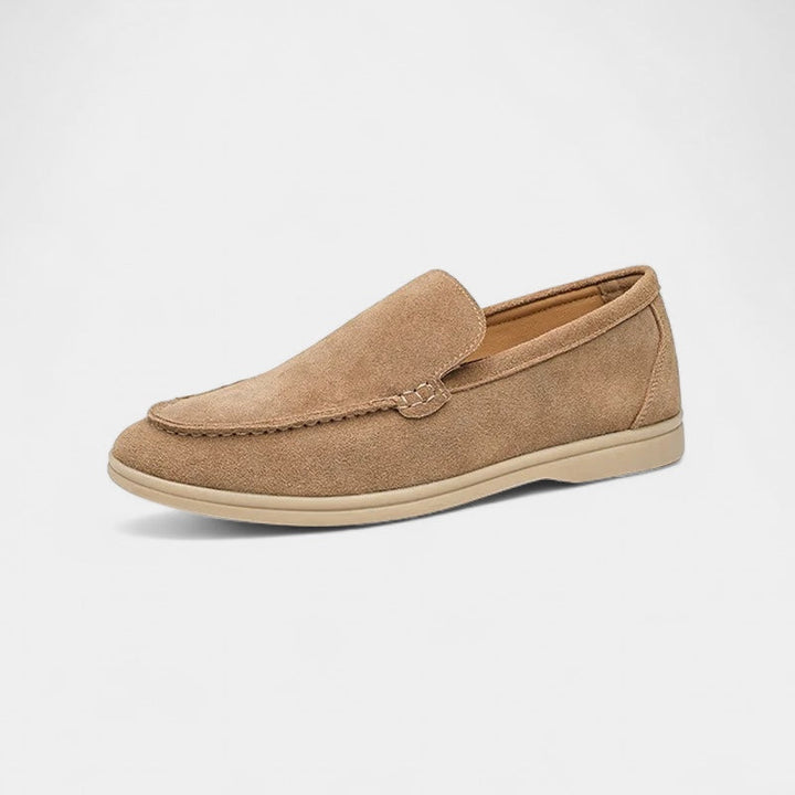 Slip-on loafers with almond-shaped toe, stitched vamp detail and flat sole