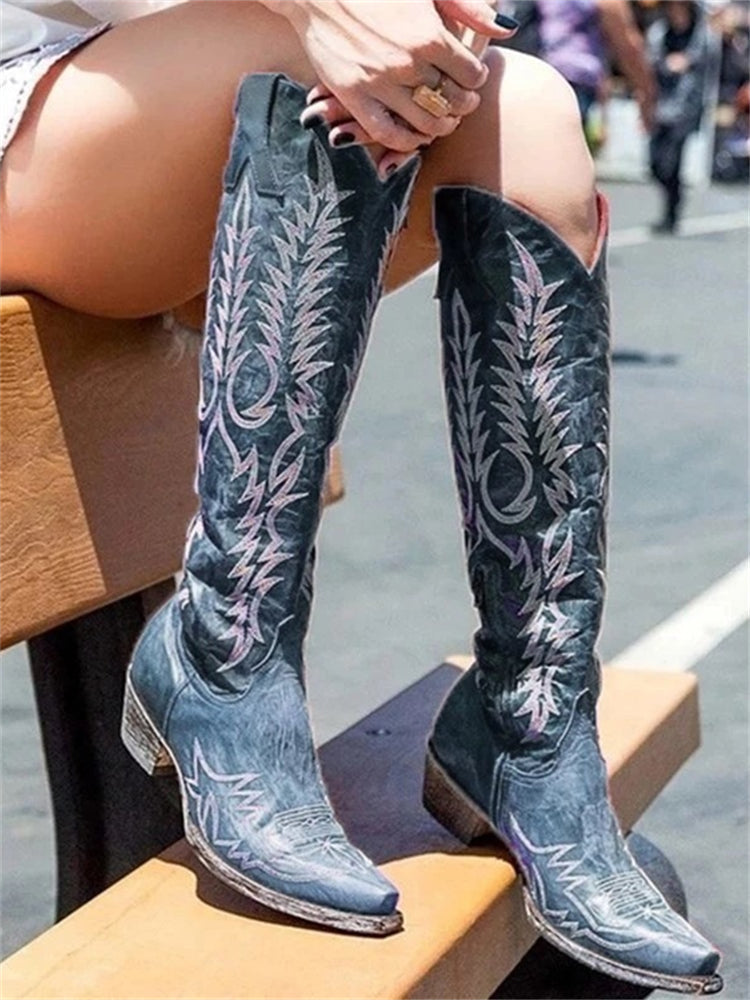 Women's knee-high cowboy boots with pointed toes and embroidered Western shaft detailing
