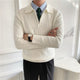 Men's ribbed quarter-zip polo sweater with long sleeves and collared neckline