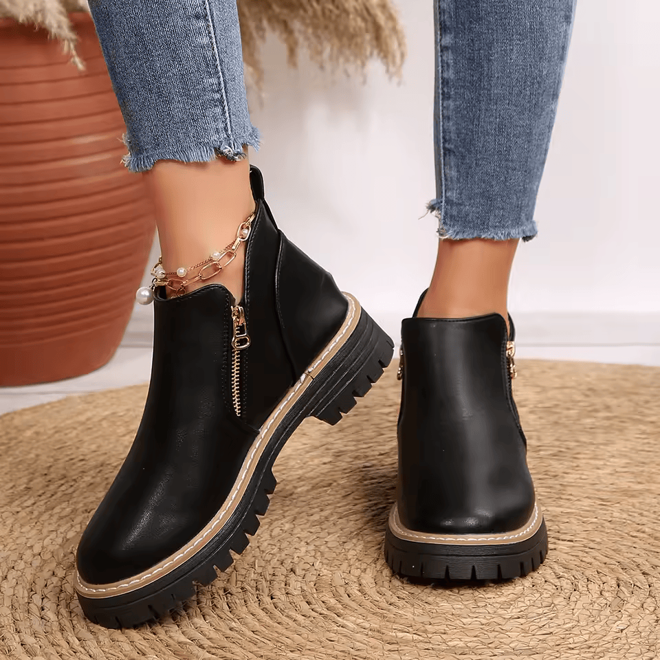 Women's platform ankle boots with side zippers and chunky lug soles
