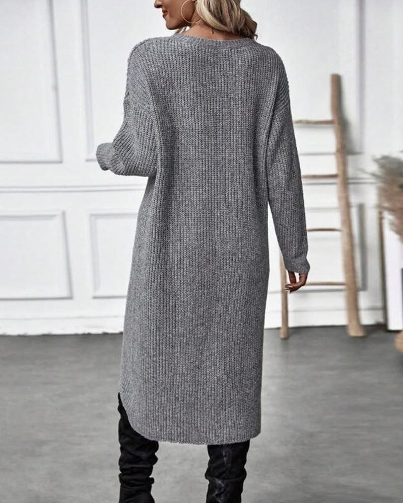 Women's knitted sweater dress with round neck, long sleeves and asymmetric hem