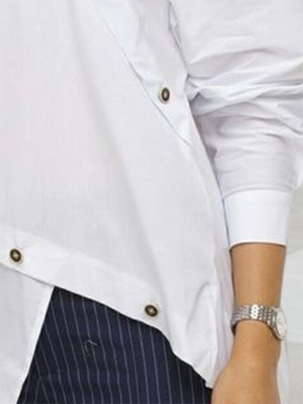 Women's white asymmetric buttoned blouse with mandarin collar and long sleeves