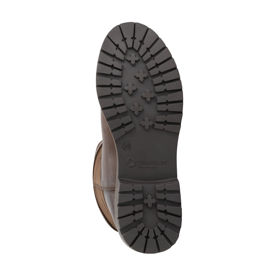 Brown tall outdoor boots with buckle straps and flat lug soles