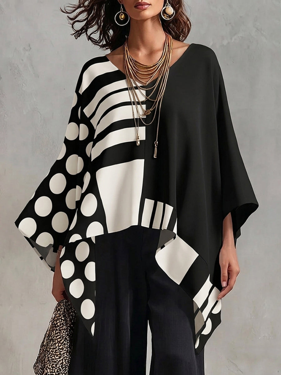 Women's oversized batwing sleeve top with polka-dot print in black and white, and green and white versions