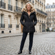 Women's quilted hooded parka jacket with textured trim