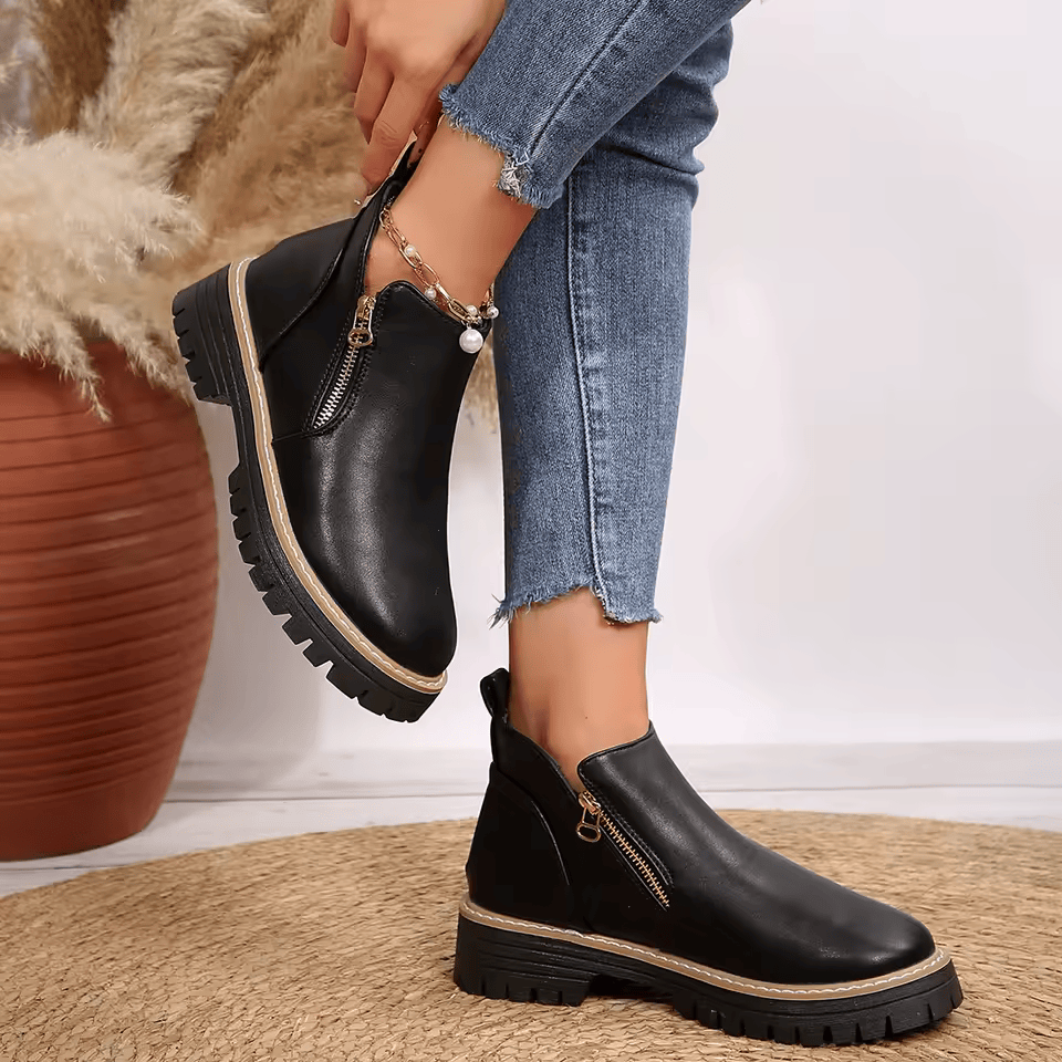 Women's platform ankle boots with side zippers and chunky lug soles